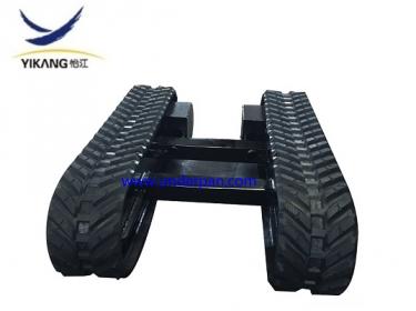 Rubber track undercarriage for drilling rig